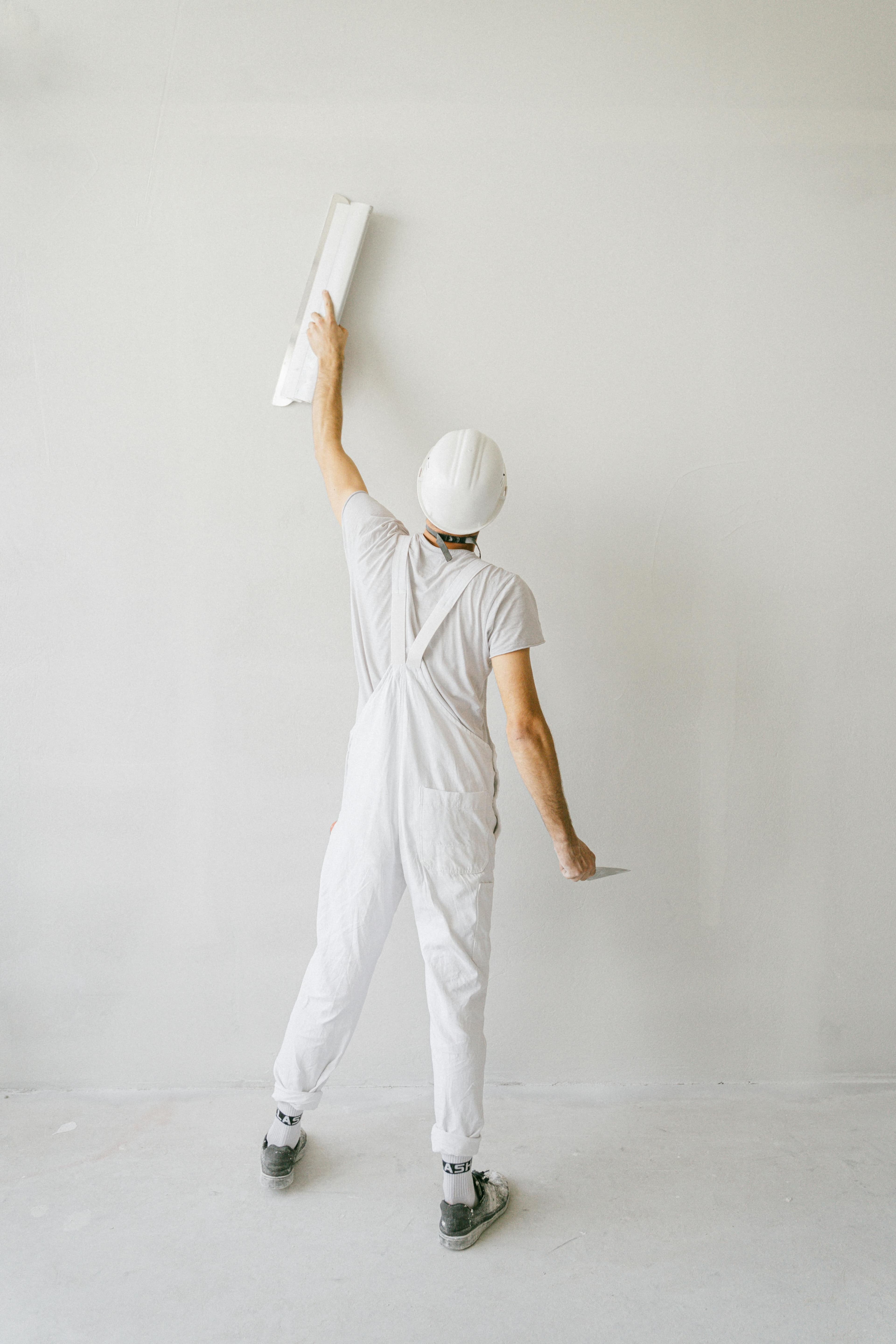 Professional painter on a qualified job site booked with Driive drive-time scheduling software