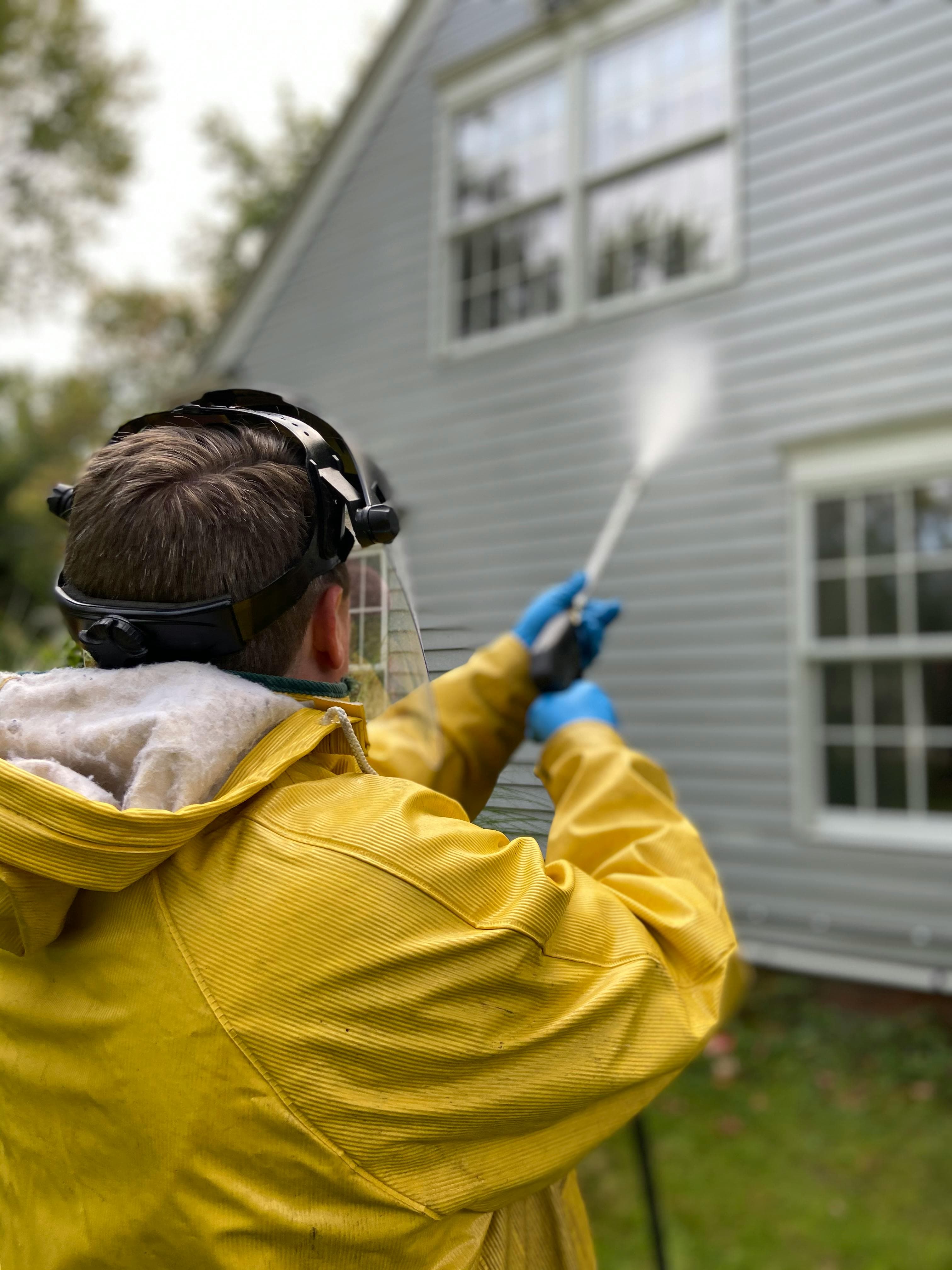 Pressure washing technician on a drive-time optimized job booked with Driive scheduling